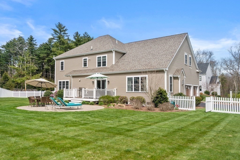 3 Dutton Drive Mansfield, MA 02048 - Photo 9 of 42 a house view with a garden space and garden