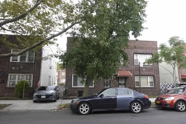 a car parked in front of a building