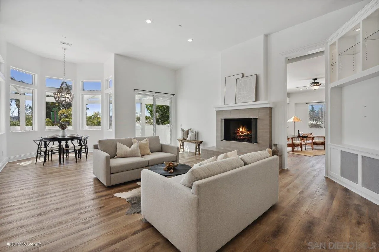 17035 Edina Court Poway, CA 92064 - Photo 19 of 52 a living room with furniture fireplace and wooden floor