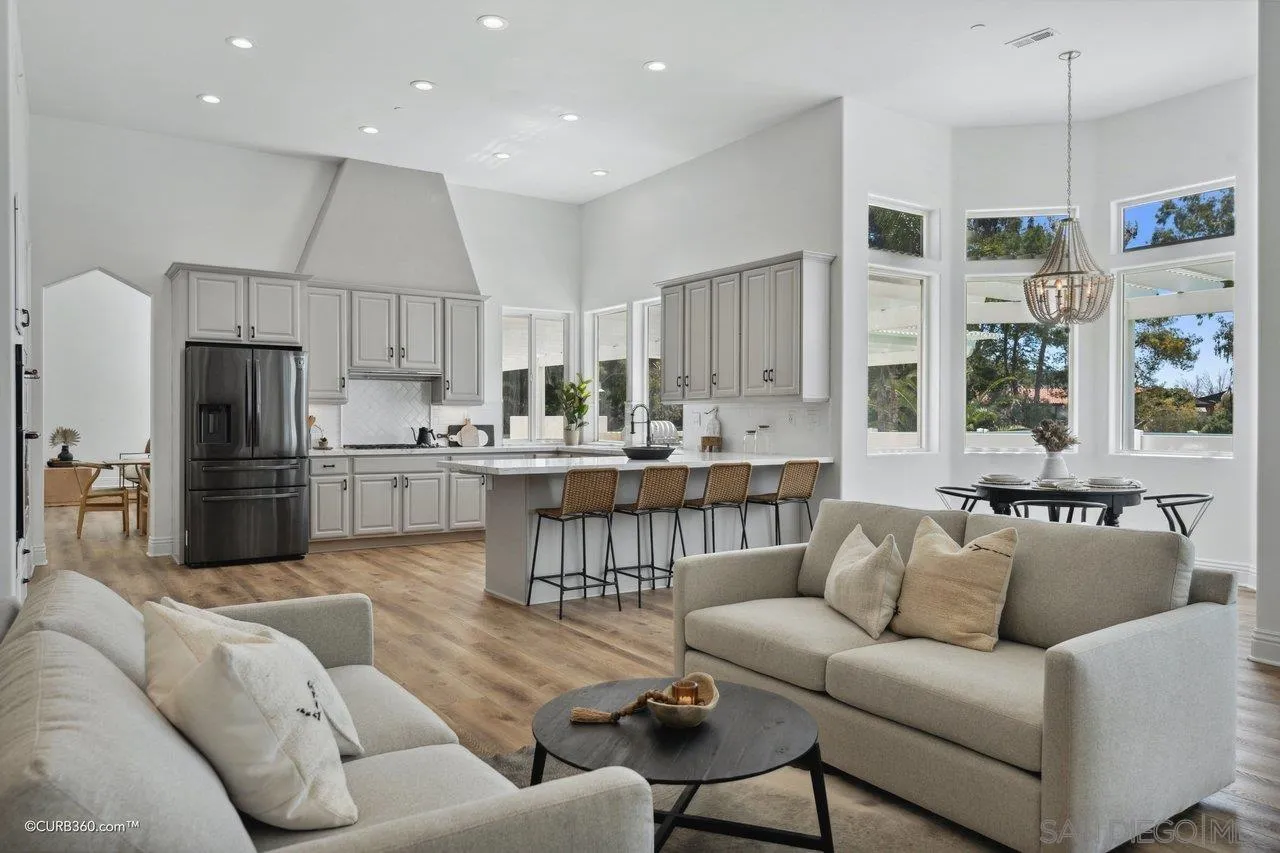 17035 Edina Court Poway, CA 92064 - Photo 20 of 52 a living room with furniture kitchen view and a refrigerator