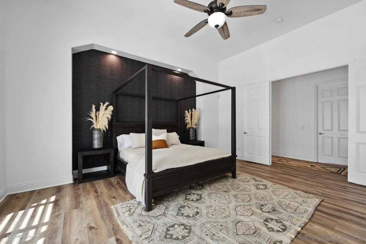 17035 Edina Court Poway, CA 92064 - Photo 23 of 52 a bedroom with a bed and wooden floor