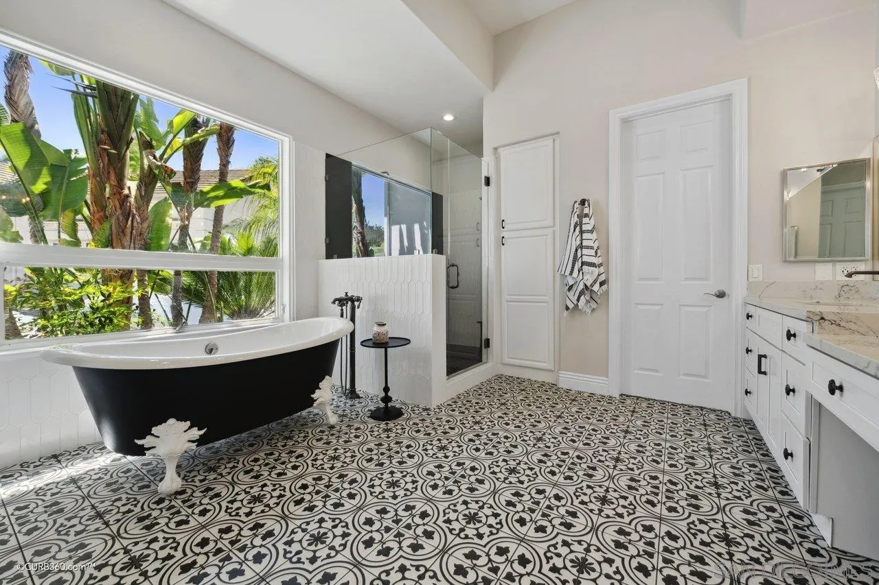 17035 Edina Court Poway, CA 92064 - Photo 24 of 52 a living room with a bathtub and a window