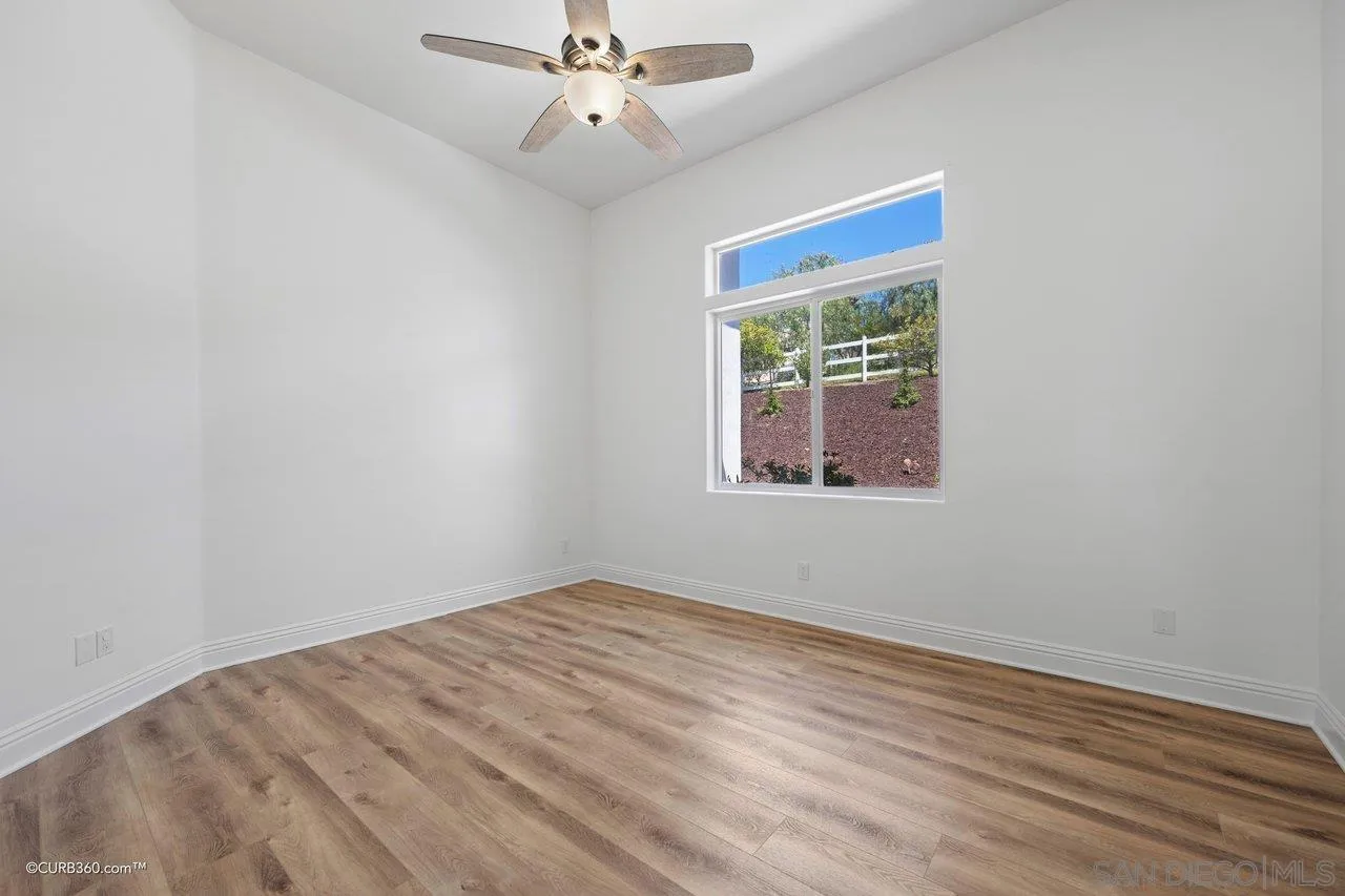 17035 Edina Court Poway, CA 92064 - Photo 32 of 52 a view of an empty room with a window