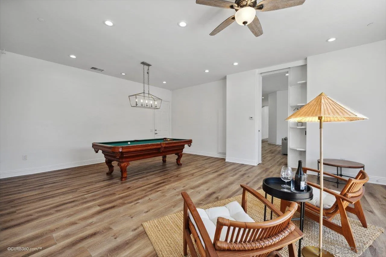 17035 Edina Court Poway, CA 92064 - Photo 37 of 52 a living room with furniture and a table