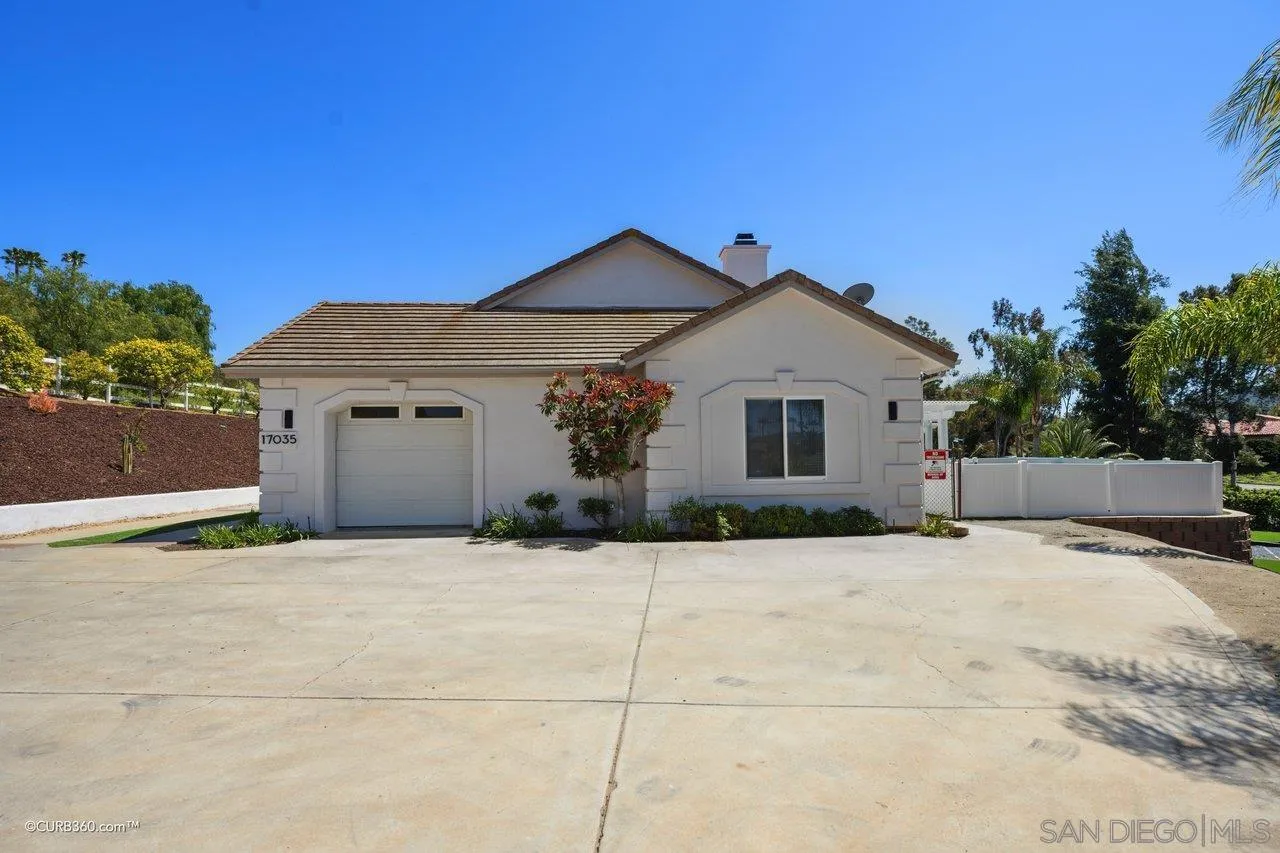 17035 Edina Court Poway, CA 92064 - Photo 50 of 52 a front view of a house with a garage