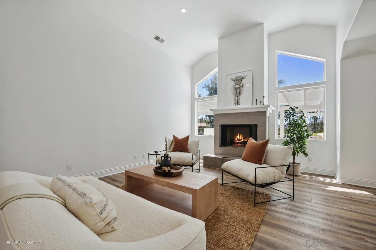 17035 Edina Court Poway, CA 92064 - Photo 5 of 52 a living room with furniture and a fireplace