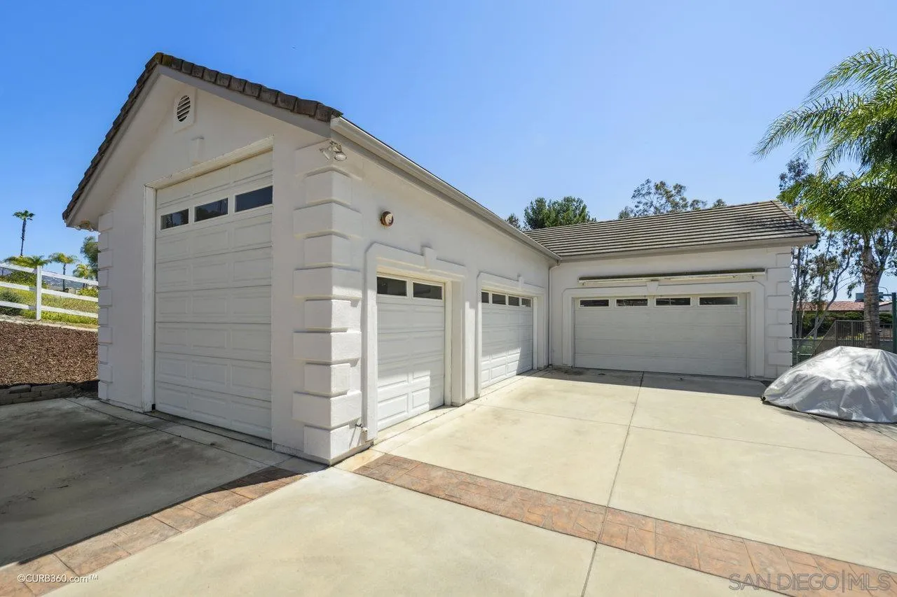 17035 Edina Court Poway, CA 92064 - Photo 52 of 52 a front view of a house with a garage