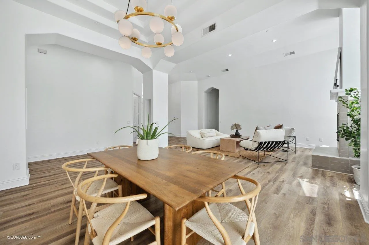 17035 Edina Court Poway, CA 92064 - Photo 7 of 52 a view of a dining room with furniture and a chandelier