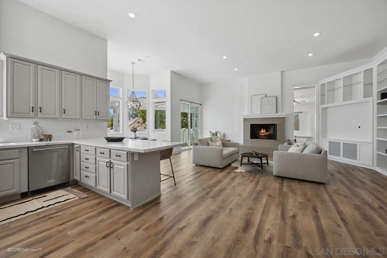 17035 Edina Court Poway, CA 92064 - Photo 10 of 52 a living room with furniture and a fireplace