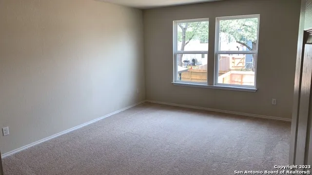 a bathroom with a toilet a sink and bathtub
