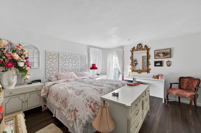 a bed room with a bed and a couch