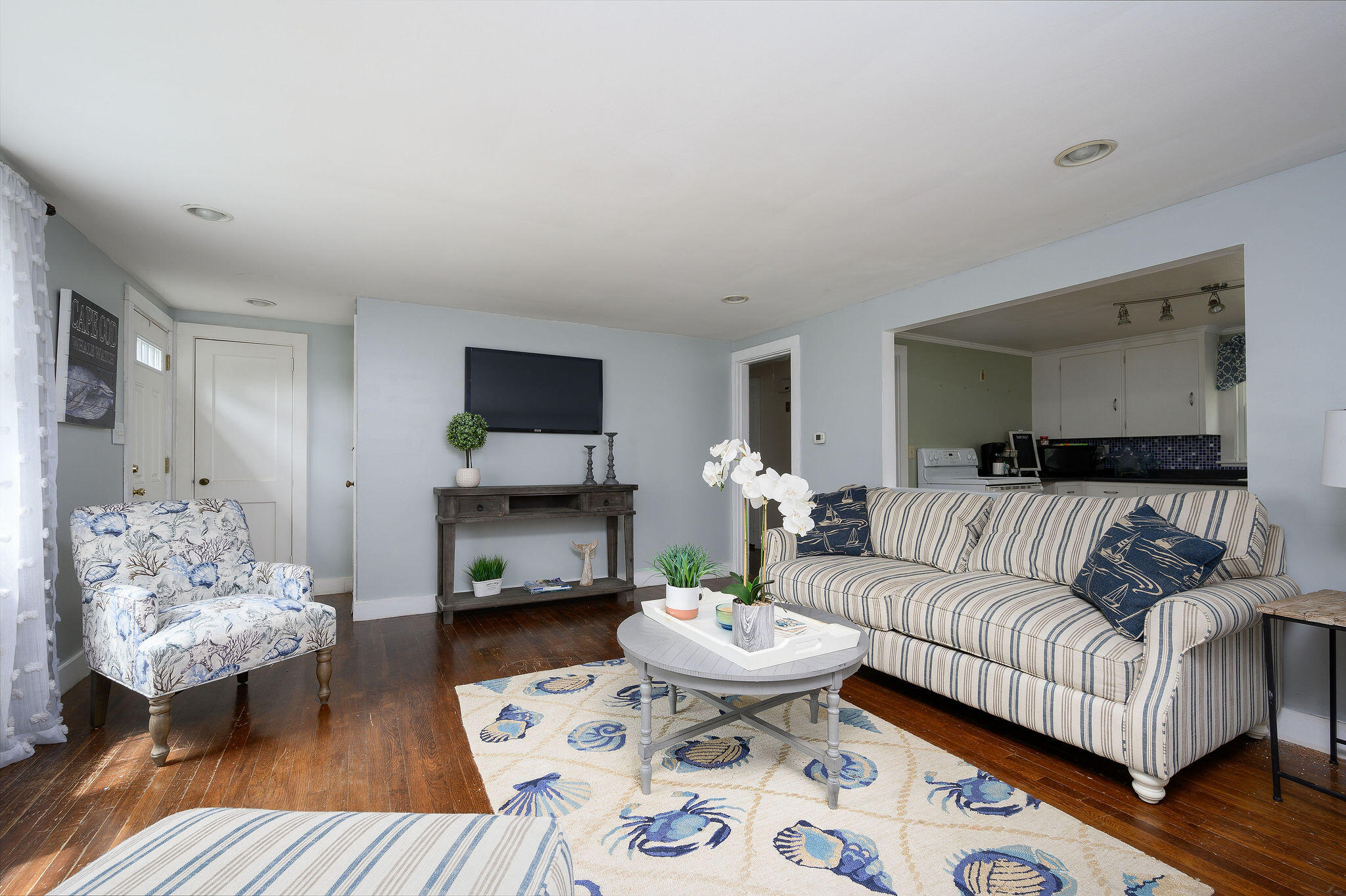 346 Old Stage Road Centerville, MA 02632 - Photo 5 of 23 a living room with furniture and a fireplace