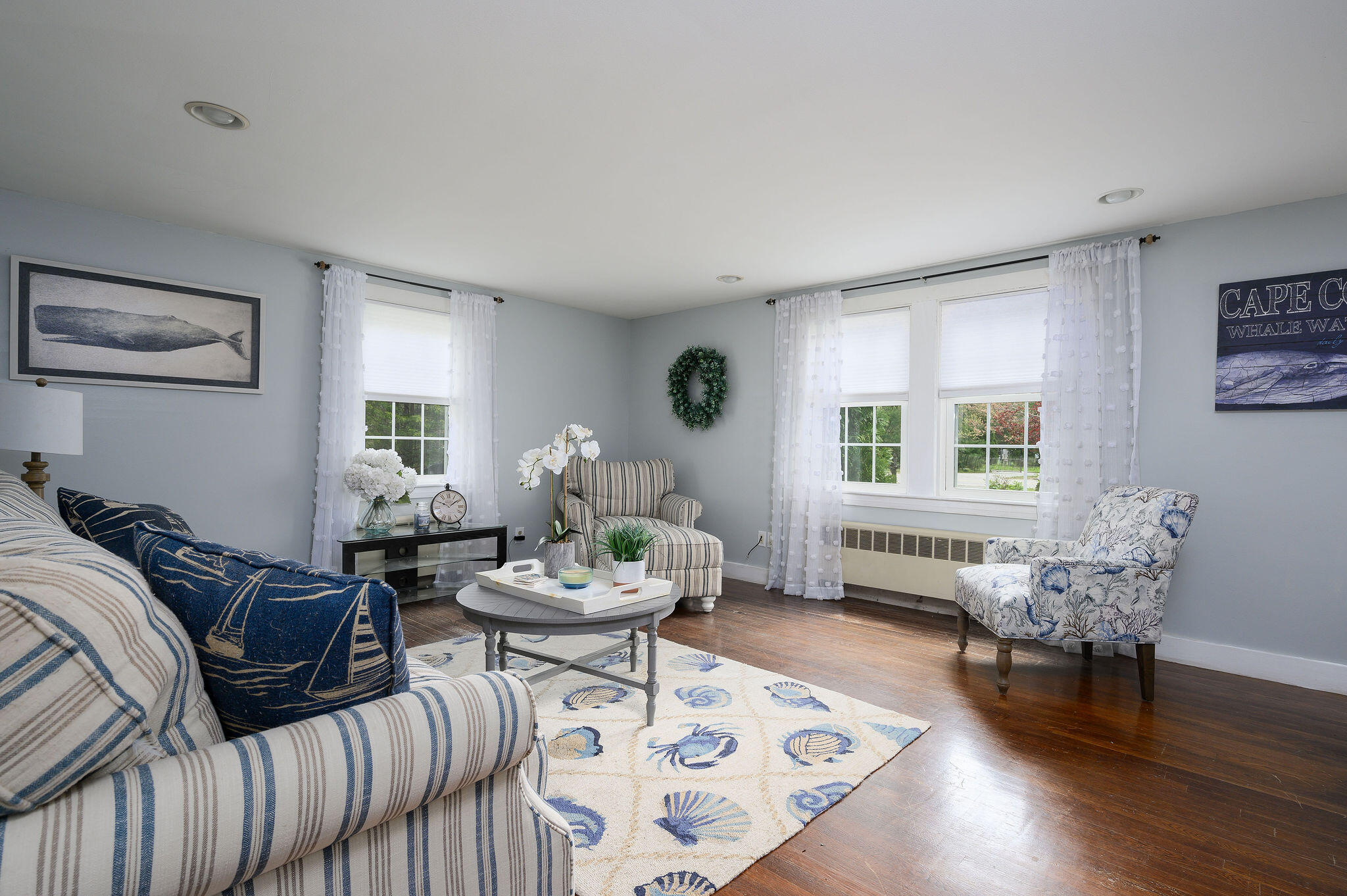 346 Old Stage Road Centerville, MA 02632 - Photo 7 of 23 a living room with furniture and wooden floor