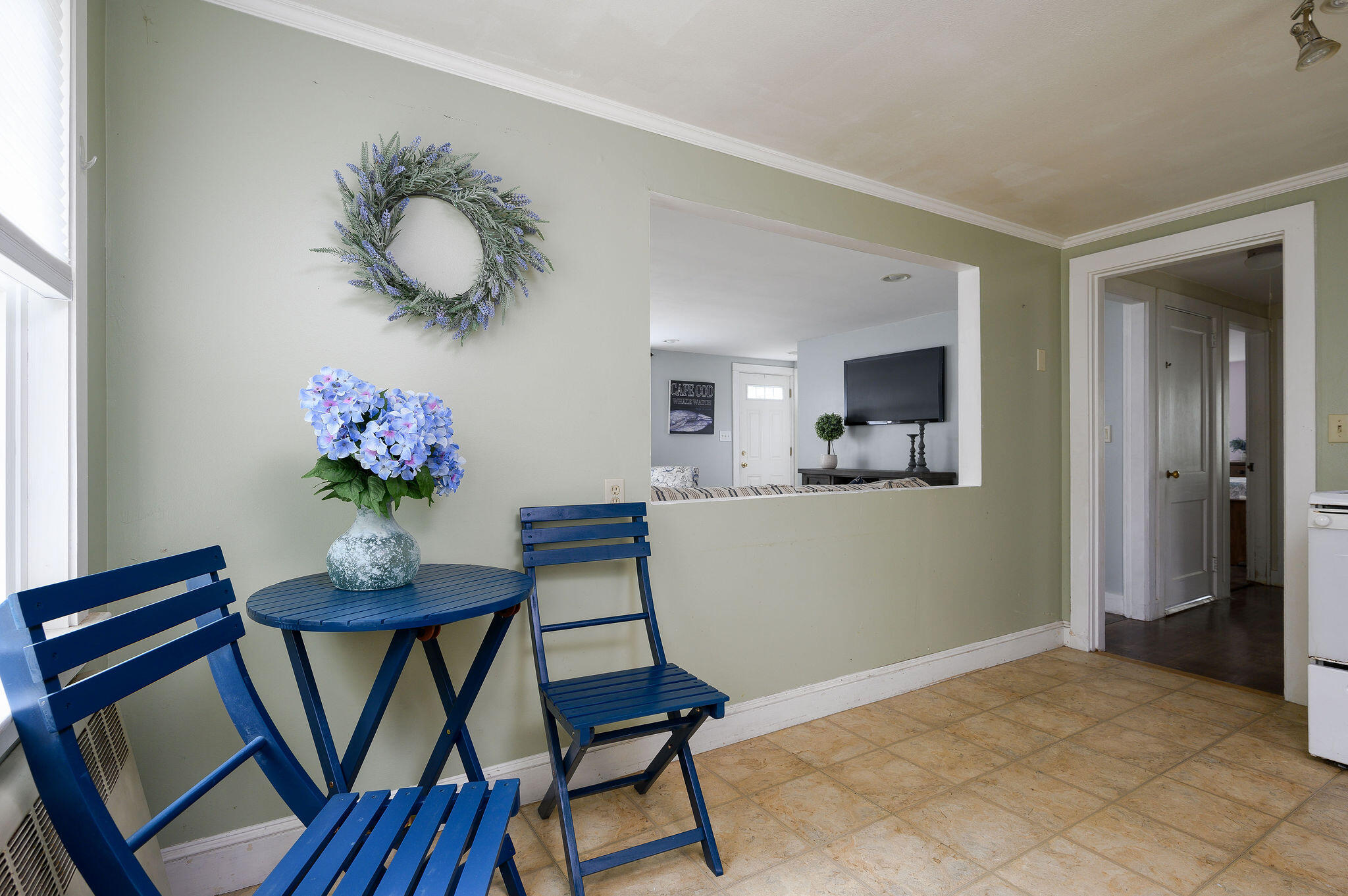 346 Old Stage Road Centerville, MA 02632 - Photo 10 of 23 a view of a dining room with furniture and wooden floor