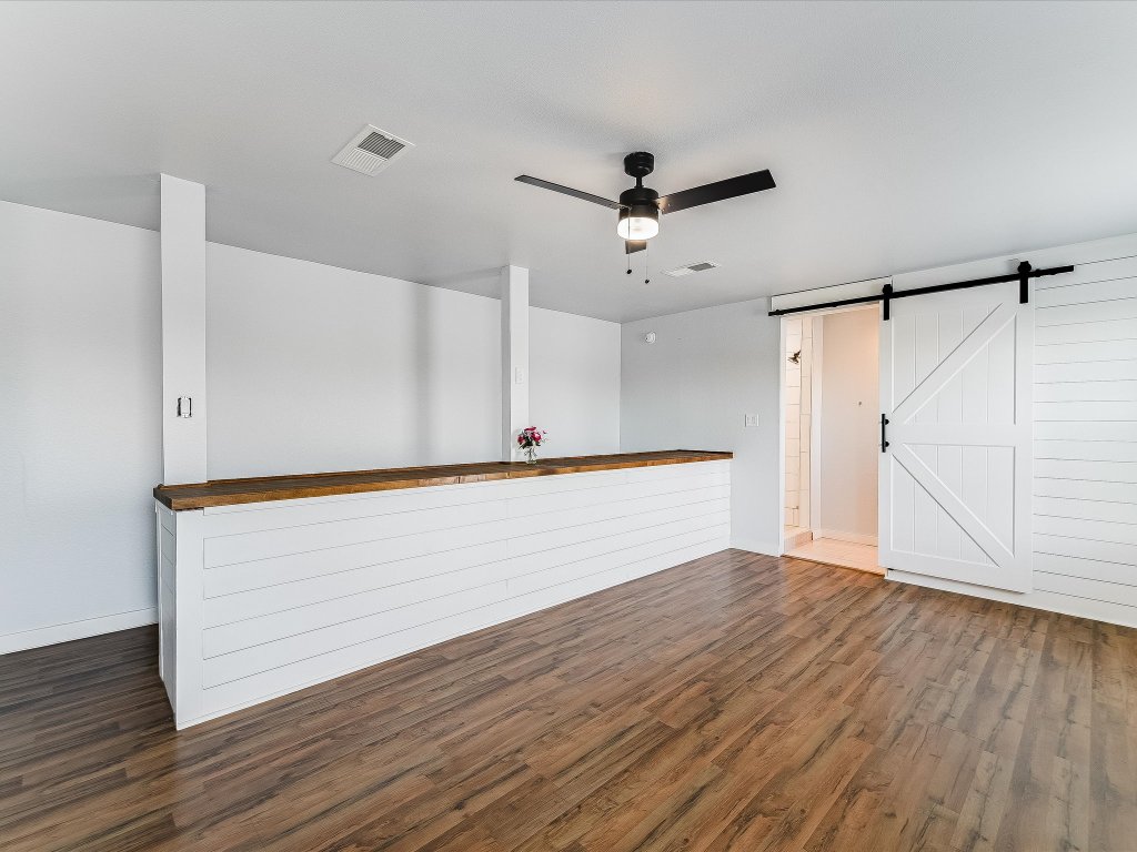 155 Travis Lane Spicewood, TX 78669 - Photo 11 of 33 a view of an empty room