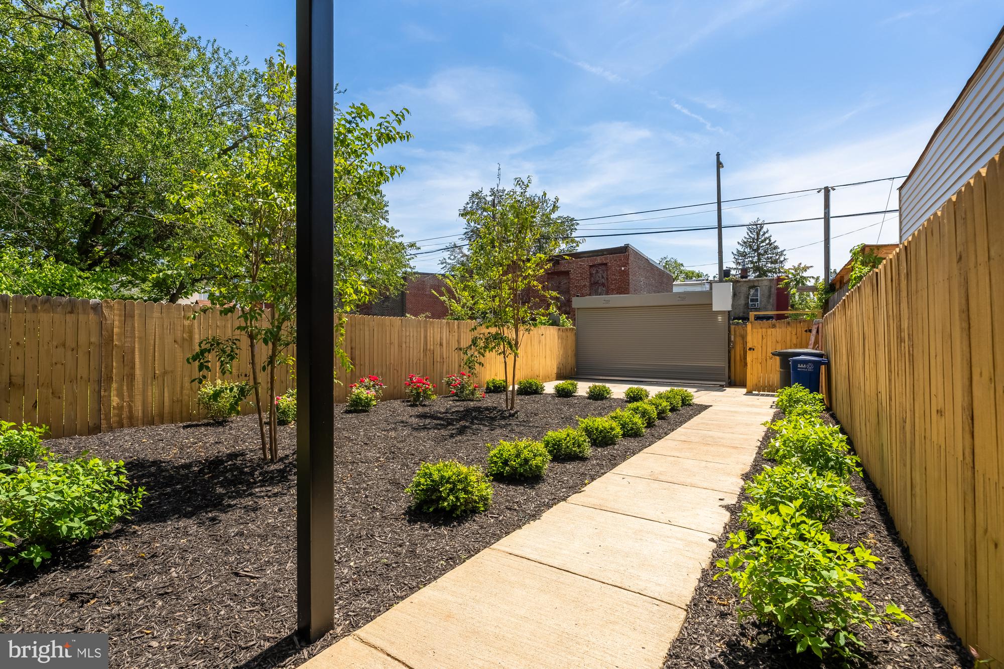 1251 Morse Street Northeast, Unit B Washington, DC 20002 - Photo 35 of 37 a view of a backyard with potted plants