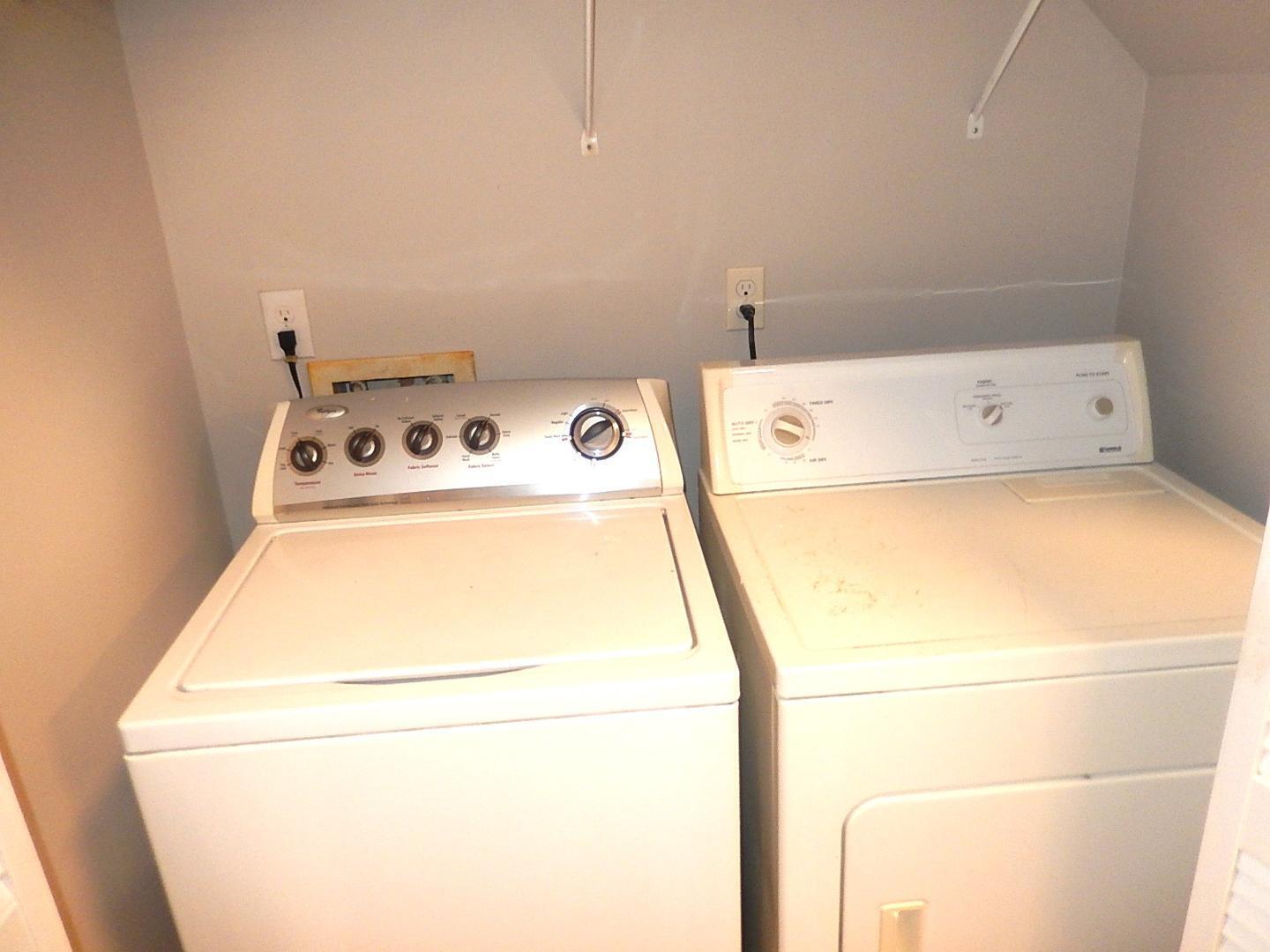 211 Bridgepath Drive Cary, NC 27513 - Photo 16 of 26 a utility room with dryer and washer