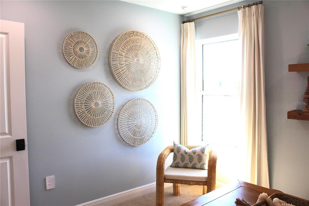 17706 Broadleaf Loop Venice, FL 34293 - Photo 15 of 16 a clock on a table in a room