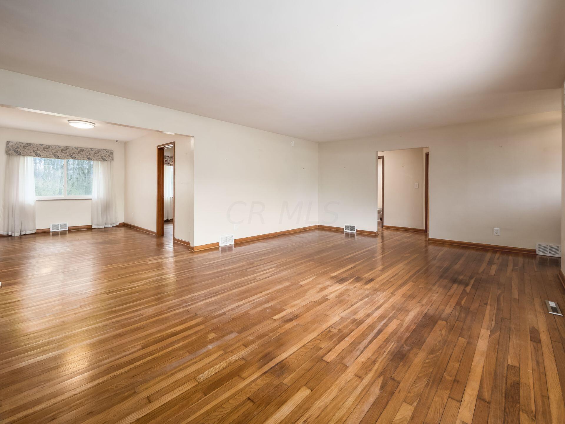 7710 Riverside Drive Dublin, OH 43016 - Photo 8 of 67 Open living space w/LR flowing into DR