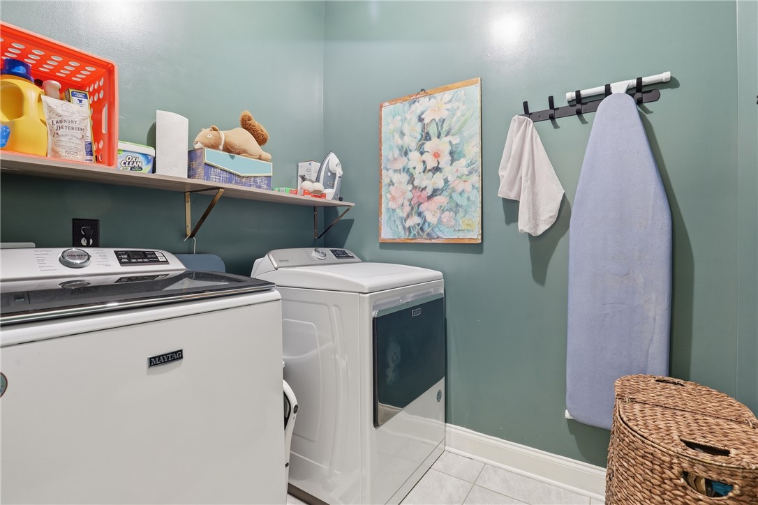 127 West Stewart Street Pelzer, SC 29669 - Photo 19 of 23 Practical and organized laundry room with essential amenities.
