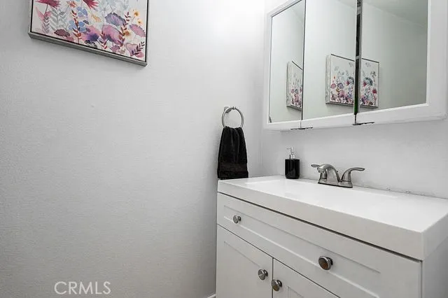 a view of balcony with wooden floor