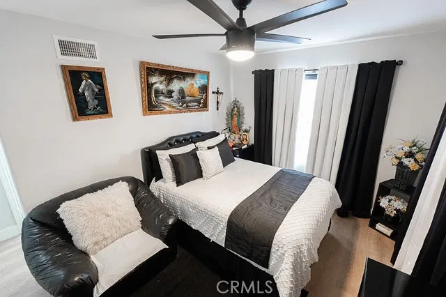 a living room with furniture fireplace and flat screen tv