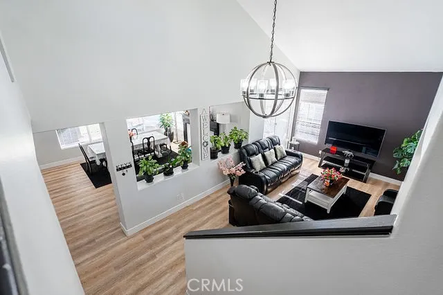 a bedroom with a bed and a mirror