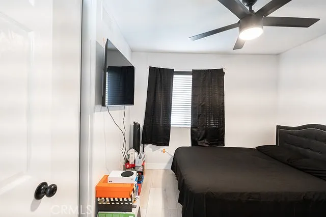 a bathroom with a double vanity sink mirror and shower