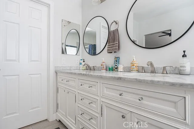 a front view of a house with swimming pool having outdoor seating