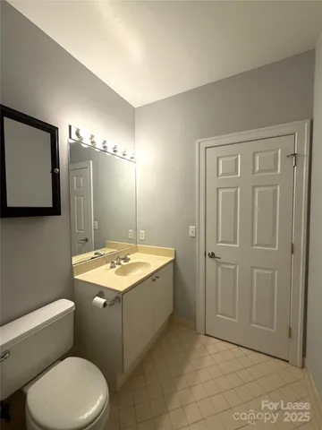 a view of gallery with wooden floor