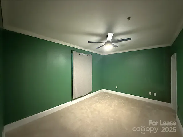 a bathroom with a granite countertop sink and a bathtub