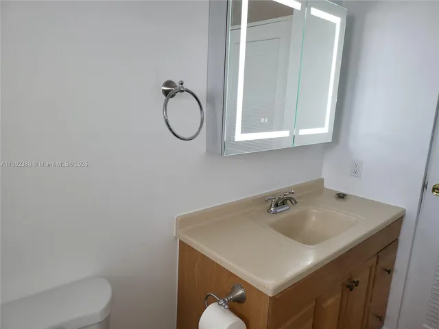 a bathroom with a sink and a toilet