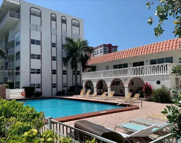 a outdoor dining space with furniture