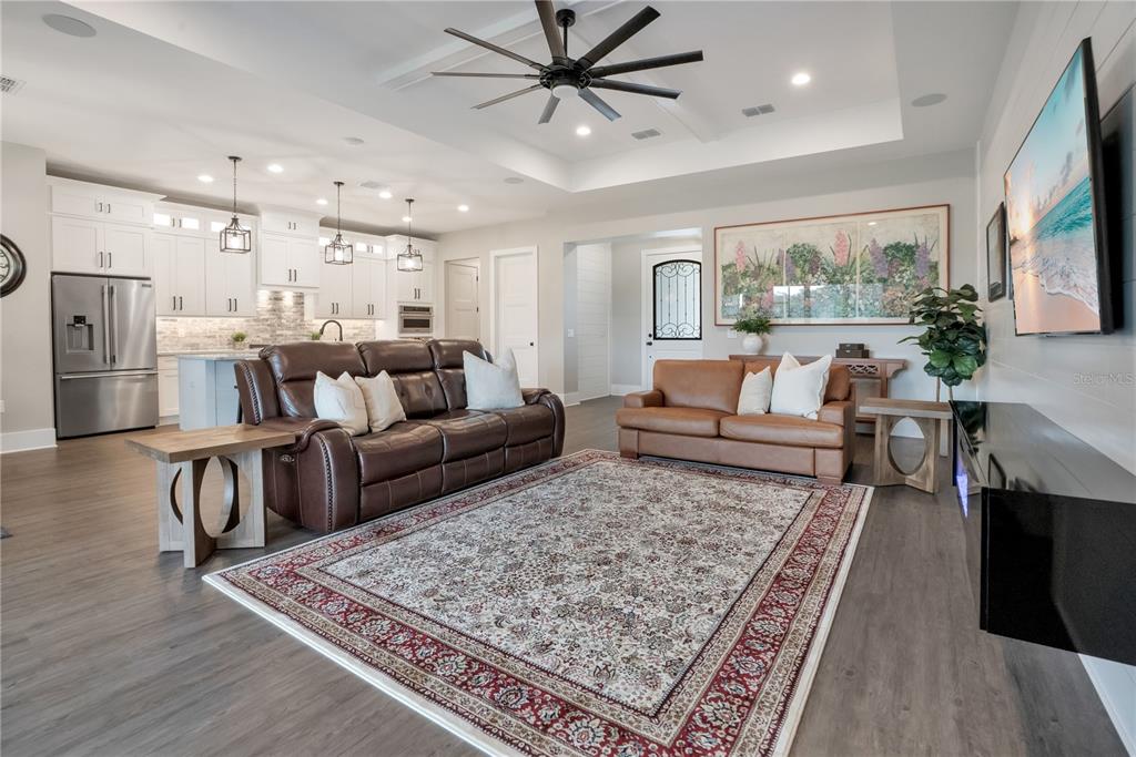 440 Palma Ceia Road Winter Haven, FL 33884 - Photo 26 of 78 a living room with furniture and a rug