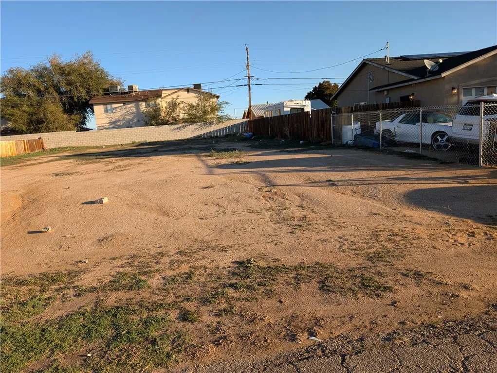 0 Aspen Edwards, CA 93523 - Photo 3 of 5 a view of a lake with a building in the background