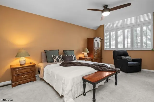 a bed room with a bed and a couch