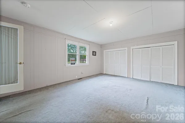 an empty room with windows