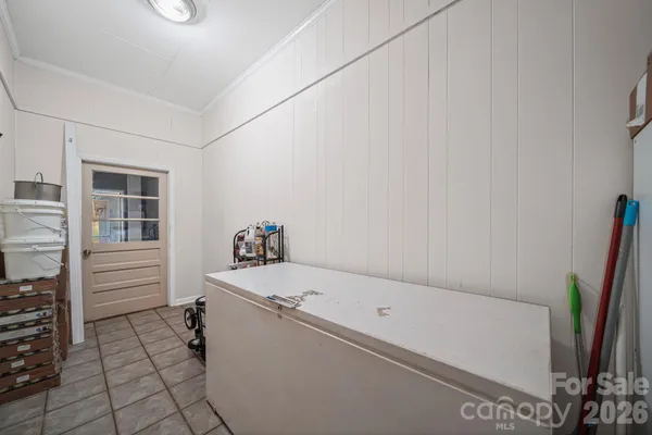 a bathroom with a tub and a sink