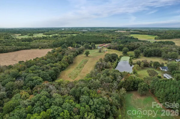 a view of a lake with a city