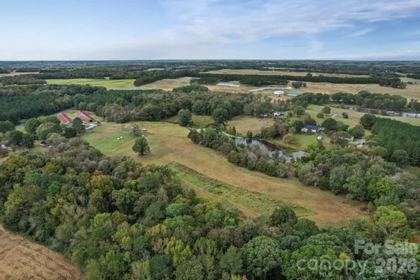 a view of a field with an outdoor space