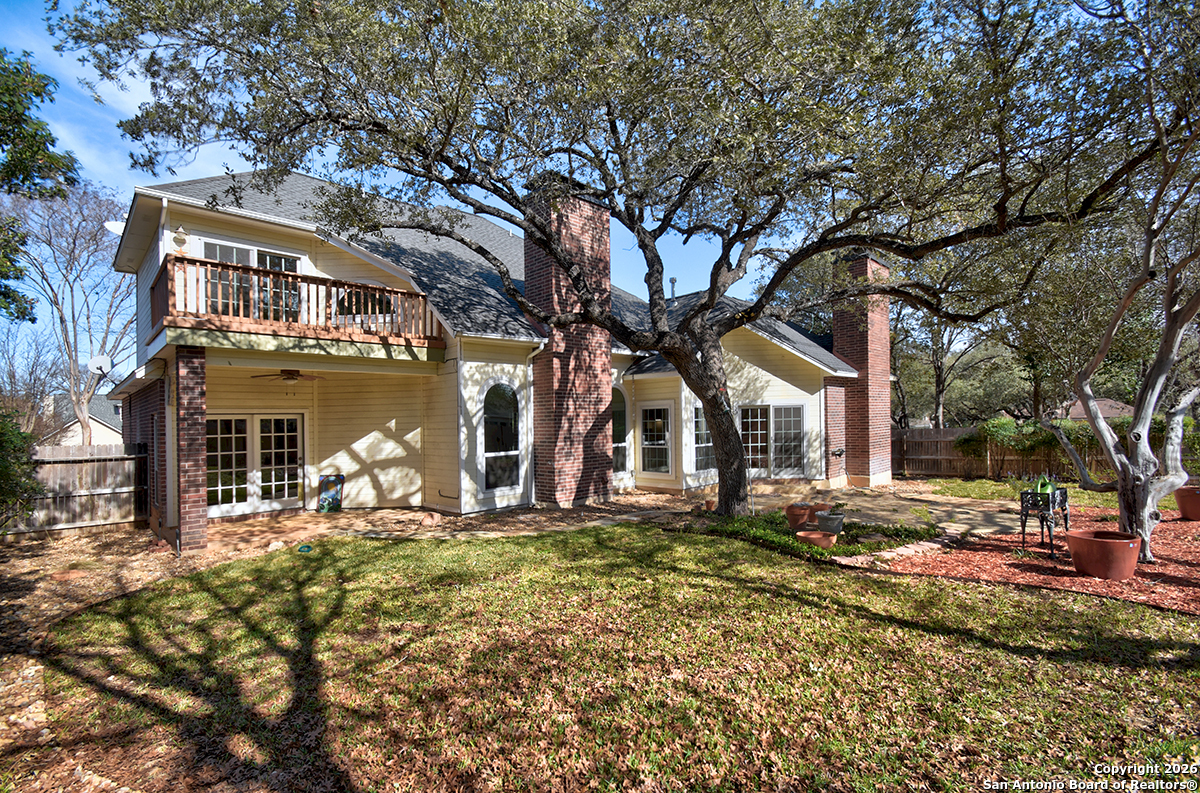 2642 Rim Oak San Antonio, TX 78232 - Photo 24 of 24 a front view of a house with a yard