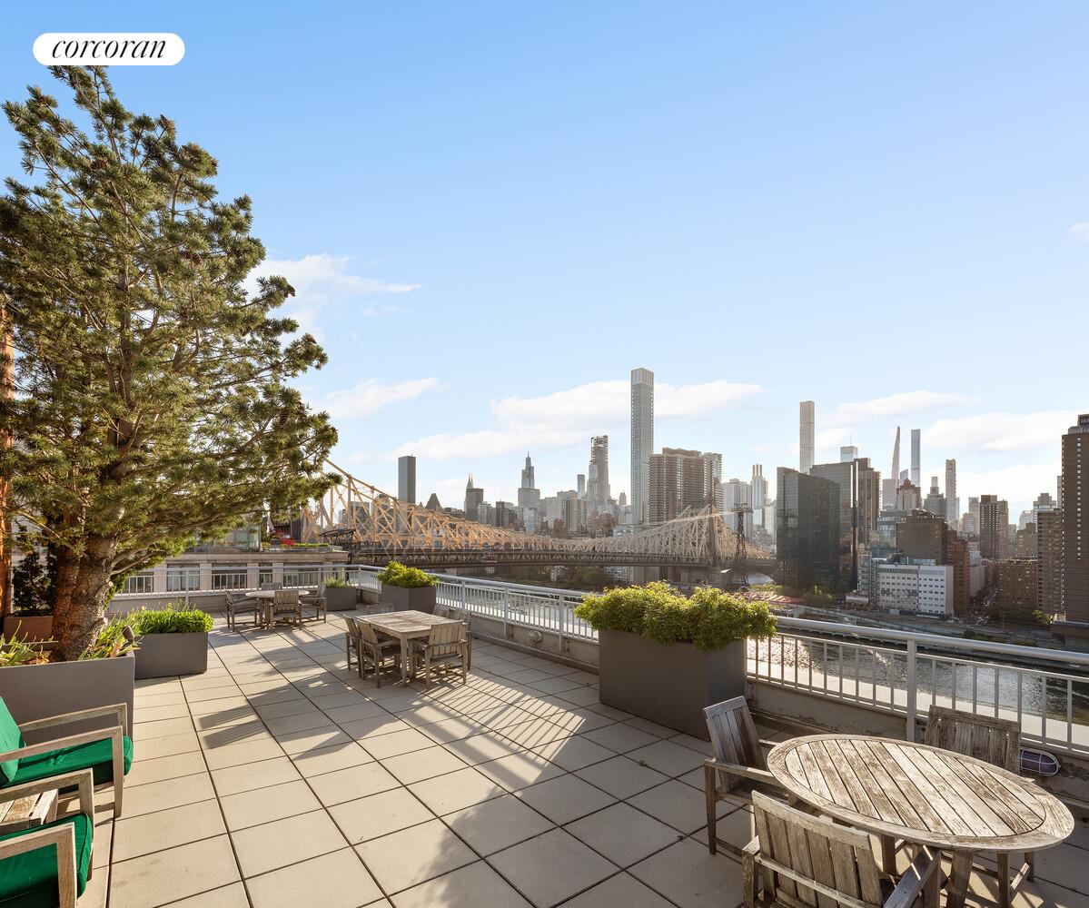 425 Main Street, Unit 14C Manhattan, NY 10044 - Photo 12 of 23 a view of a terrace with sitting area