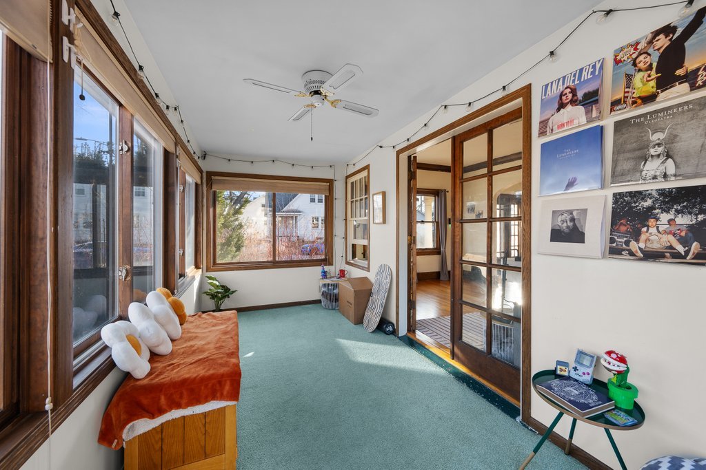 2545 18th Avenue A Moline, IL 61265 - Photo 11 of 28 a living room with furniture and a potted plant