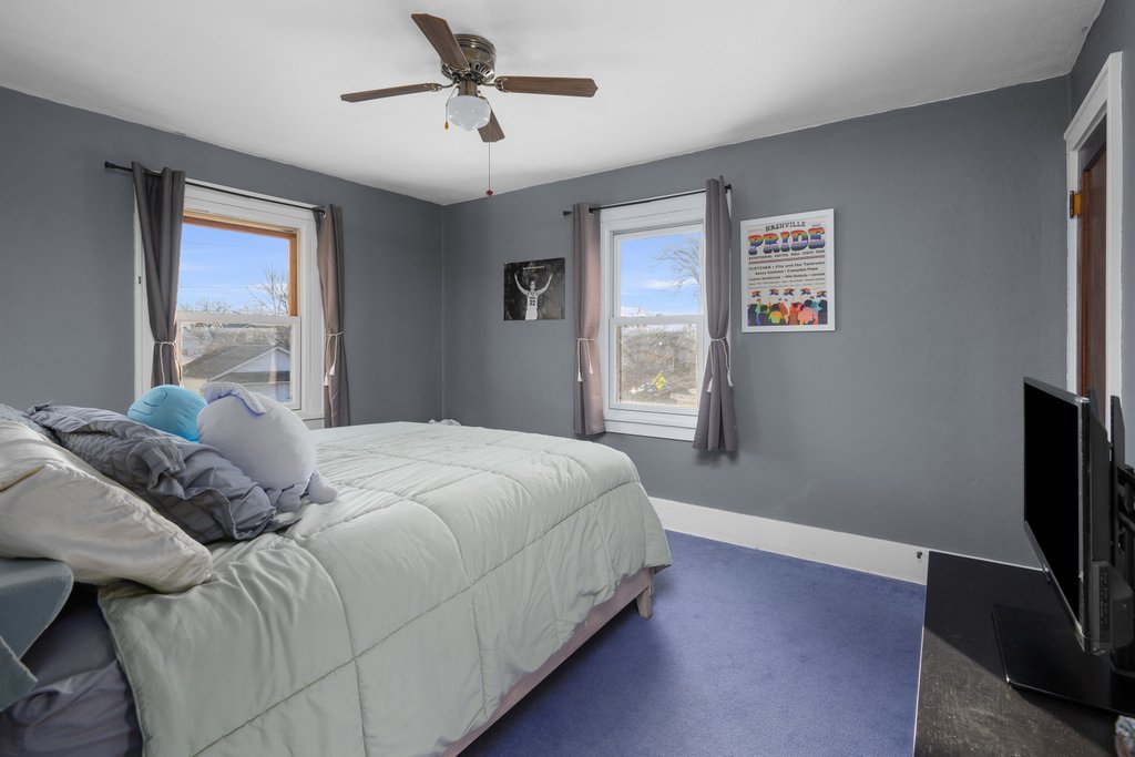 2545 18th Avenue A Moline, IL 61265 - Photo 21 of 28 a bedroom with a bed and a flat screen tv