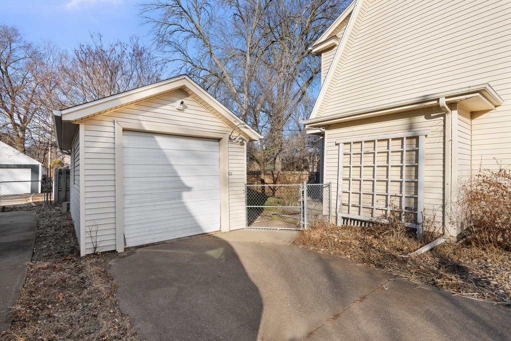 2545 18th Avenue A Moline, IL 61265 - Photo 25 of 28 a view of a house with a yard and garage