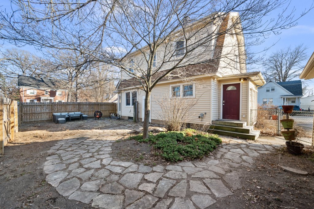 2545 18th Avenue A Moline, IL 61265 - Photo 26 of 28 a front view of a house with a yard