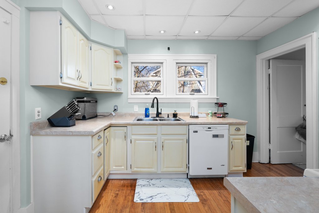 2545 18th Avenue A Moline, IL 61265 - Photo 8 of 28 a kitchen with a sink window and cabinets