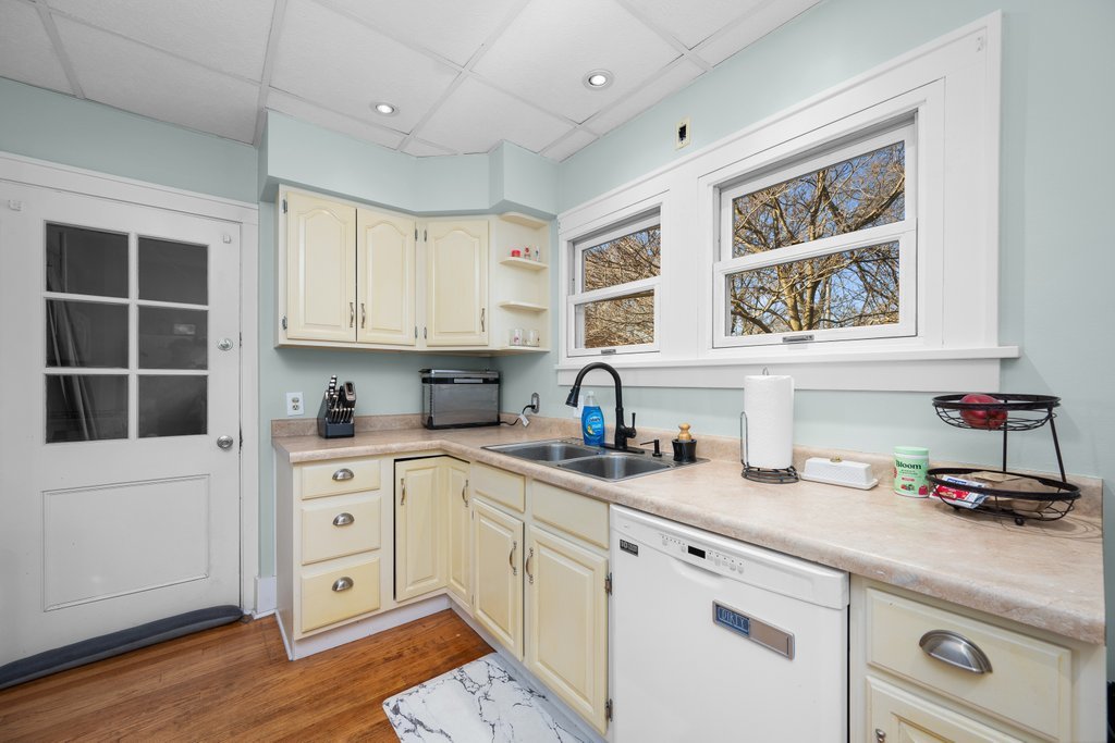 2545 18th Avenue A Moline, IL 61265 - Photo 10 of 28 a kitchen with stainless steel appliances cabinets a stove and a window