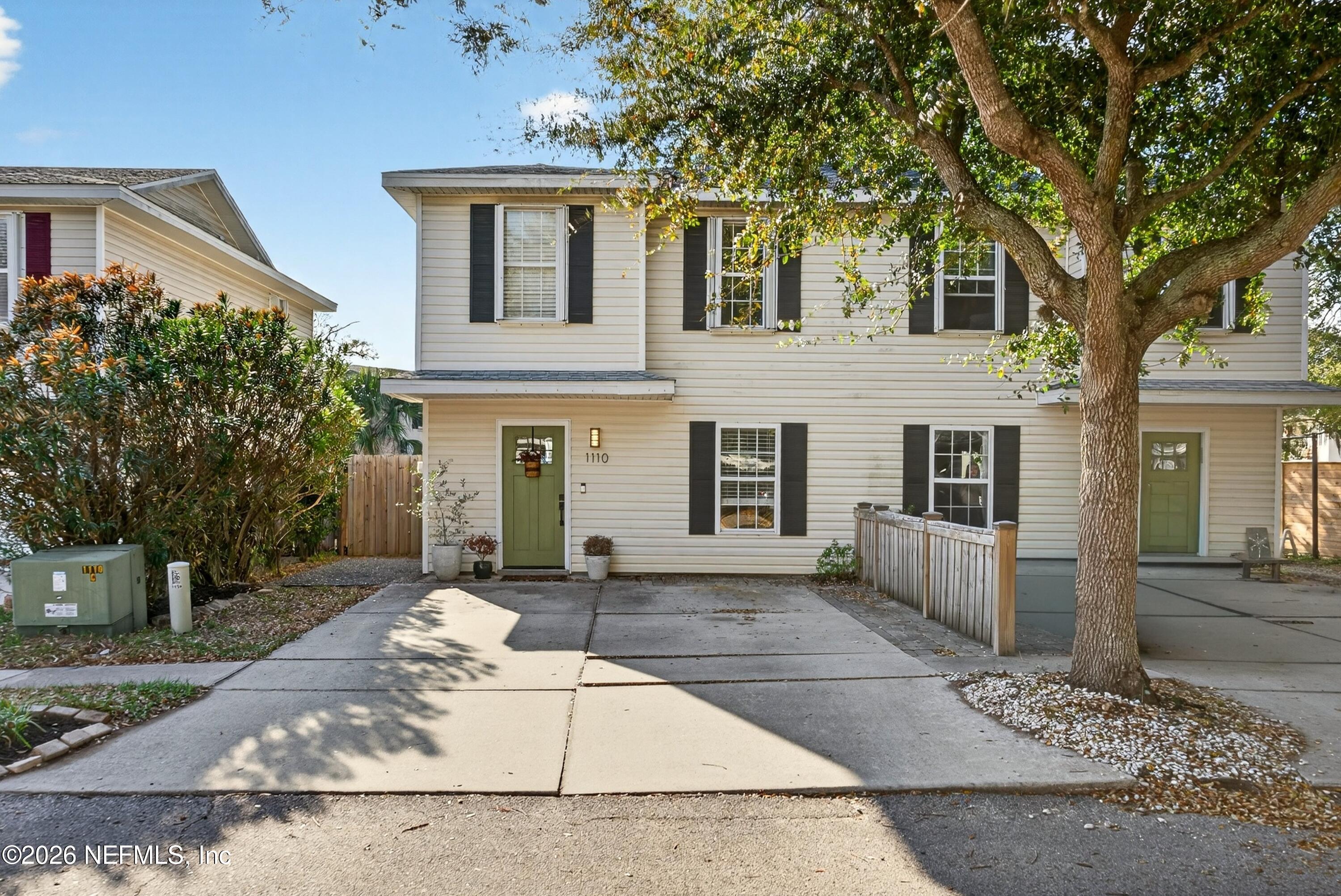 1110 Scheidel Court Atlantic Beach, FL 32233 - Photo 1 of 24 front view of a house with a yard