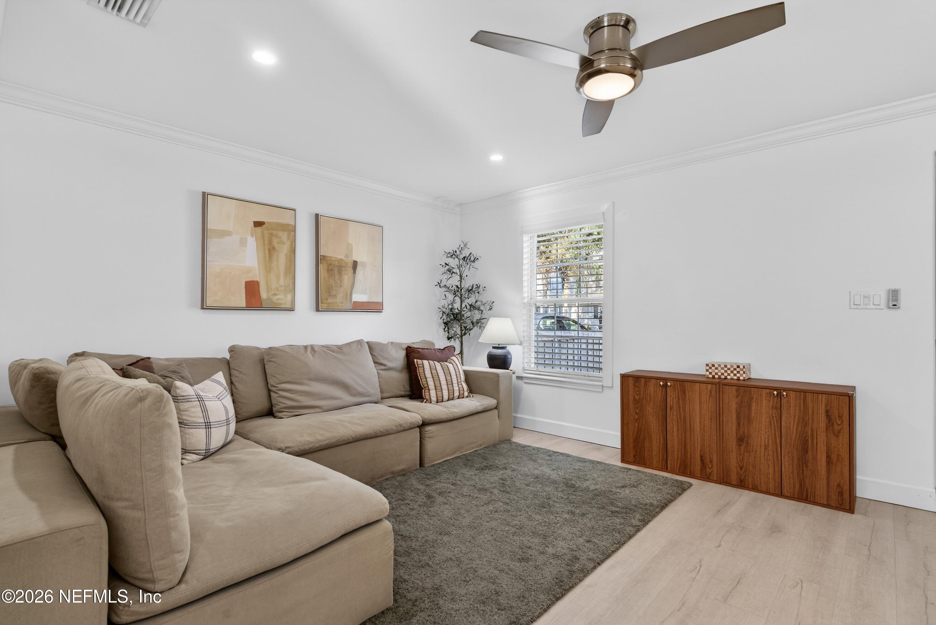 1110 Scheidel Court Atlantic Beach, FL 32233 - Photo 9 of 24 a living room with furniture and a ceiling fan